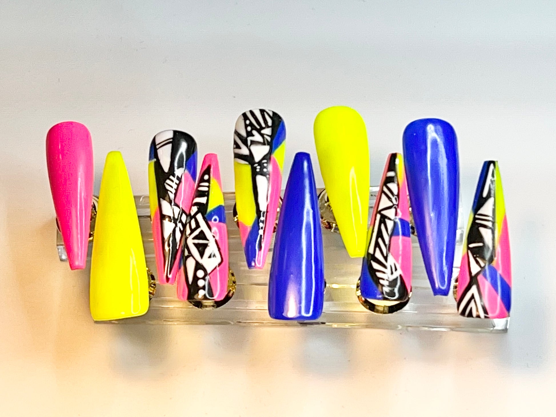 Pink, Yellow and Blue Nails featuring 4 Mosaic Nail Designs